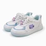 Pair of girls' white casual sneakers with sky blue glitter and cute cartoon design imported from China.