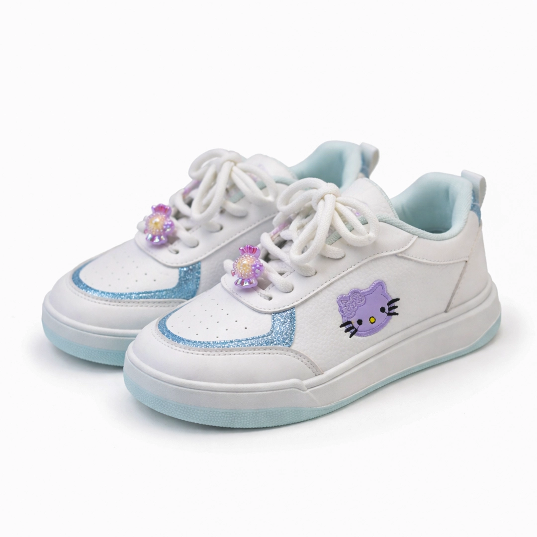 Pair of girls' white casual sneakers with sky blue glitter and cute cartoon design imported from China. Pair of girls' white casual sneakers with sky blue glitter and cute cartoon design imported from China.