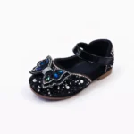 Black glitter party shoes for girls with blue stone butterfly design