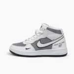 Side Profile of White and Grey Mid Top Sneakers for Men.