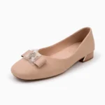 Side view of premium nude ladies office shoes with low block heel