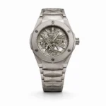Luxury silver metal watch for men featuring an open-work skeleton dial design.