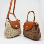 Styled shot of women's handmade bamboo handle woven bags in cream and tan colors in Bangladesh