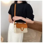 Model wearing the women's small beige handmade rattan crossbody bag in Bangladesh