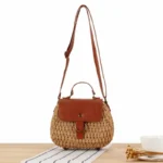Women's casual summer beach straw bag showing adjustable crossbody strap in Bangladesh