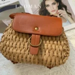 Women's large vintage straw crossbody bag in warm tan with brown flap available in Bangladesh