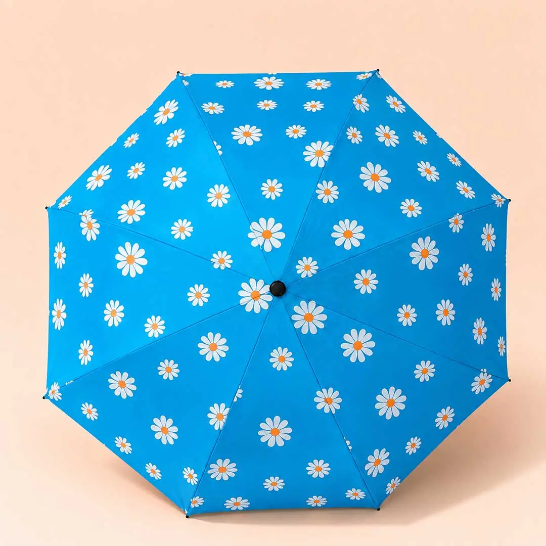 Bright blue rainproof and UV blocking floral parasol for girls. Bright blue rainproofs and UV blocking floral parasol for girls.